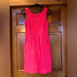 J. McLaughlin solid Pink sleeveless shift dress w/loose side pockets. Lined.